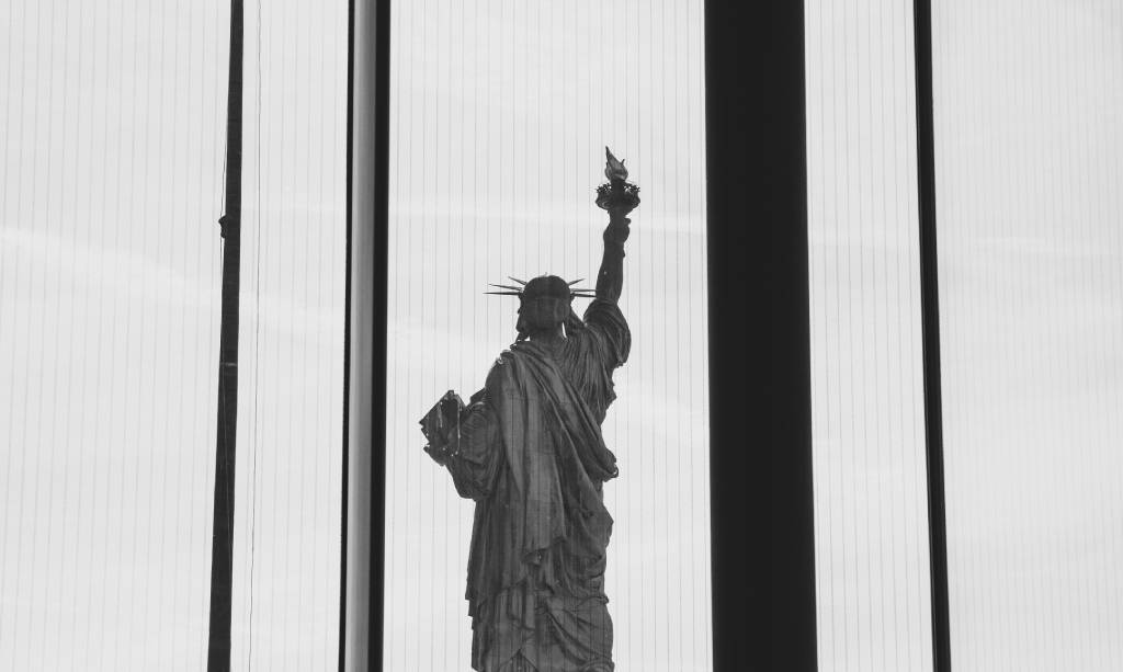 Statue of Liberty viewed through a window