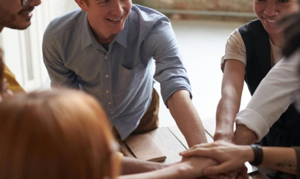 Professionals collaborating around a table