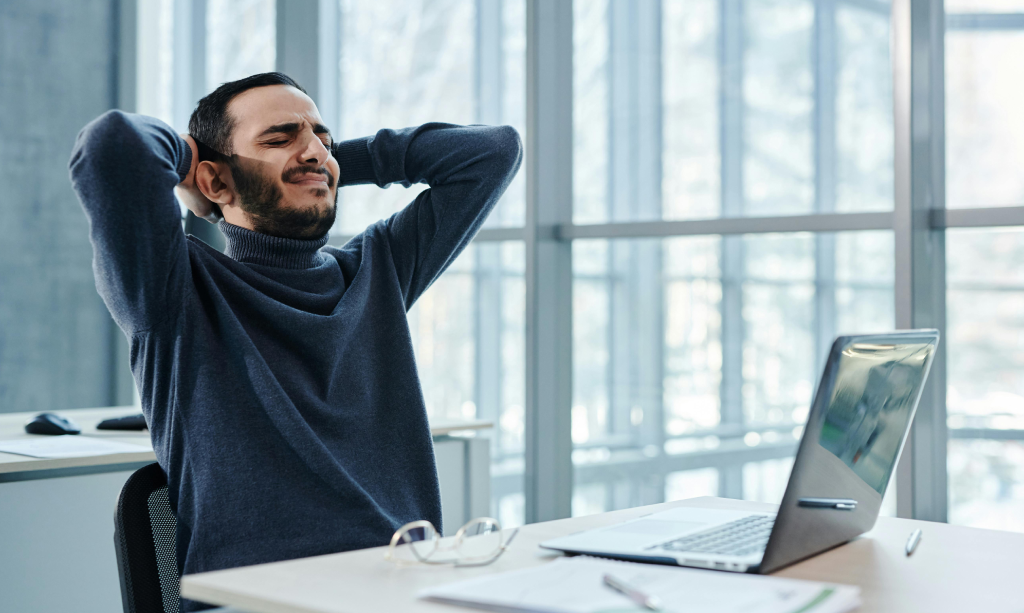 Professional sitting near a window