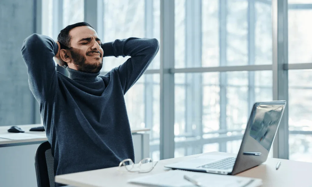 Professional sitting near a window